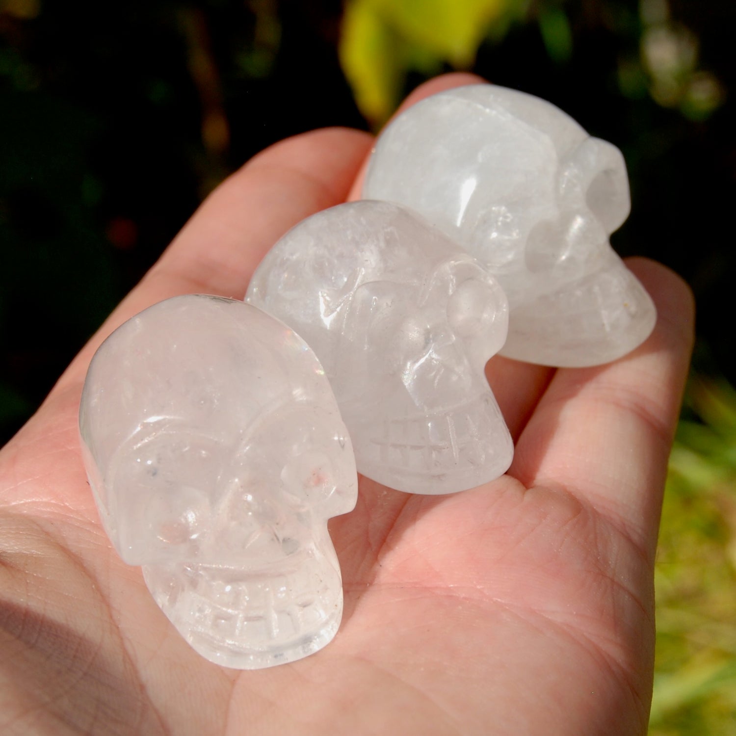 ONE 1.5" Clear Quartz Crystal Skull, Primitive Style Carving