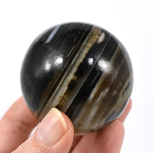 Load image into Gallery viewer, 2in 220g Sulemani Eye of Shiva Banded Sardonyx Crystal Sphere, India
