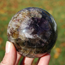 Load image into Gallery viewer, Super Seven Cacoxenite Amethyst Crystal Sphere
