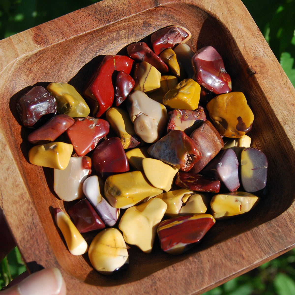 These pieces measure approximately .6 to .9 inches with most measuring .75 inches.  These Tiger's Eye tumbled stones are sold in sets of 6 pieces.