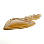 Side view of vintage-style Sacred Heart ex voto milagro ornament showing decorative metalwork