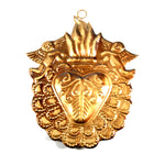 Ornate Sacred Heart of Jesus milagro featuring angel figures and radiant rays surrounding a flaming heart