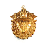 Ornate Sacred Heart of Jesus milagro featuring angel figures and radiant rays surrounding a flaming heart