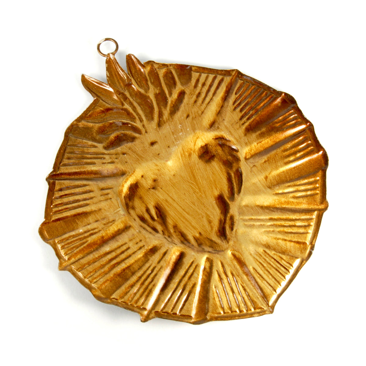 Reverse side of 6in pressed metal Sacred Heart starburst milagro ornament