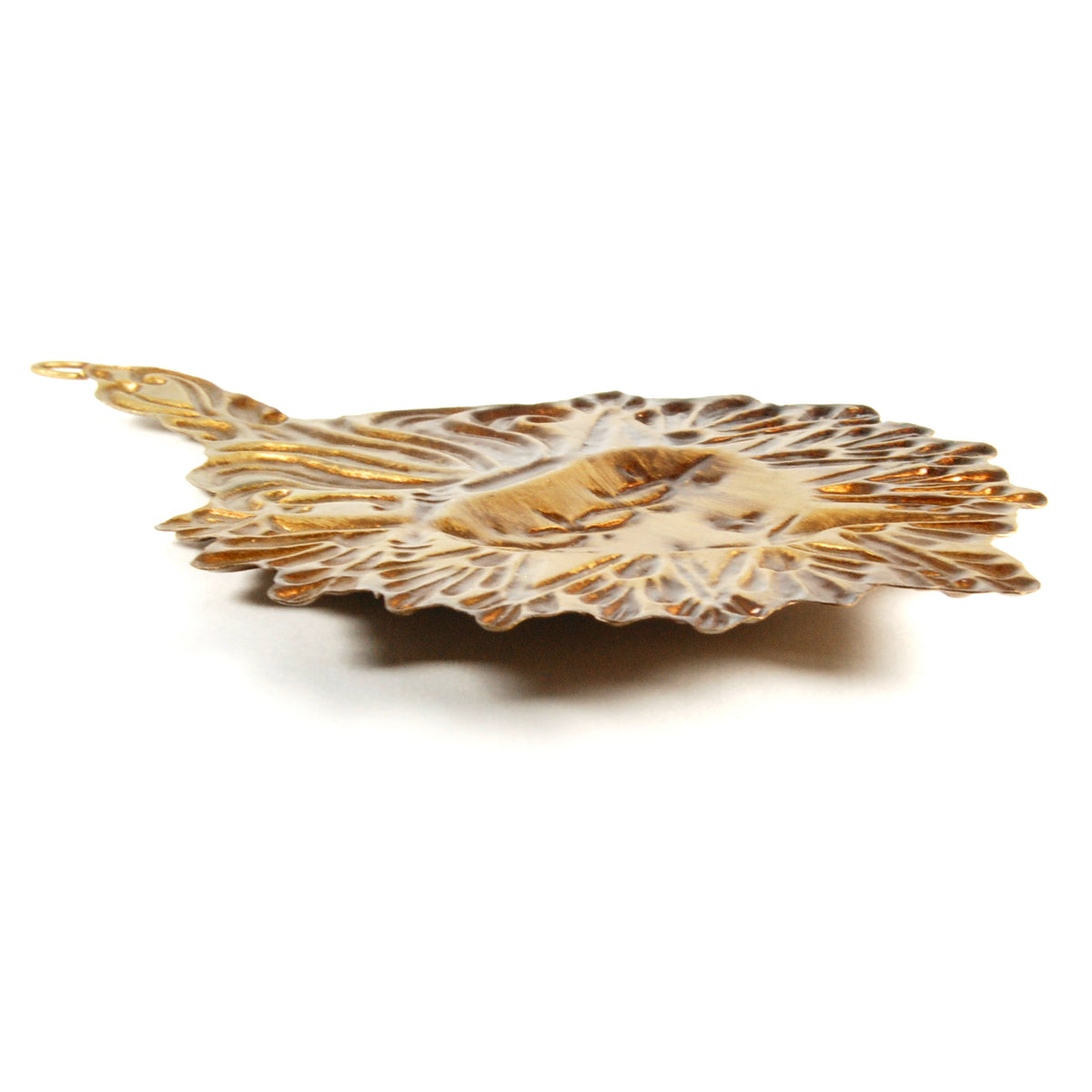 Side view of vintage-style Sacred Heart ex voto ornament with decorative sunburst metalwork