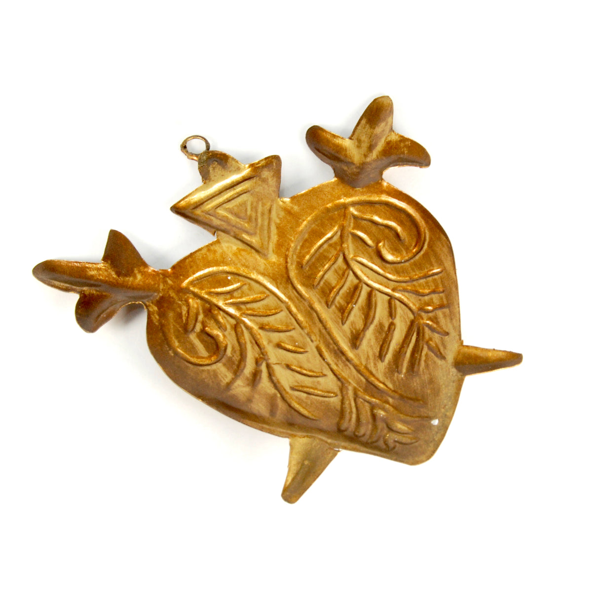 rear view Ornate flaming Sacred Heart milagro with two crossed swords, vintage-style religious decoration
