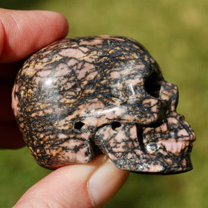 Pink Rhodonite Carved Crystal Skull