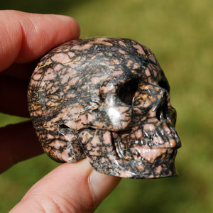 Pink Rhodonite Carved Crystal Skull