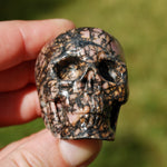 Pink Rhodonite Carved Crystal Skull