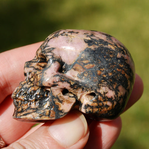 Pink Rhodonite Carved Crystal Skull