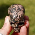 Pink Rhodonite Carved Crystal Skull