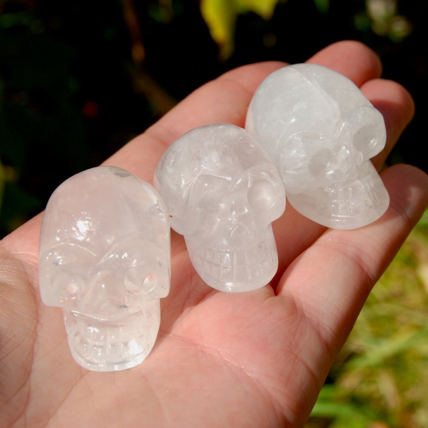 ONE 1.5in Clear Quartz Crystal Skull, Primitive Style Carving