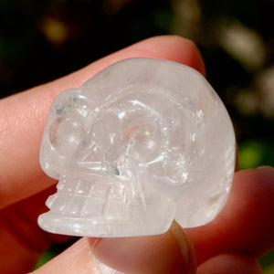 ONE 1.5in Clear Quartz Crystal Skull, Primitive Style Carving