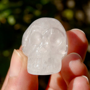 ONE 1.5in Clear Quartz Crystal Skull, Primitive Style Carving