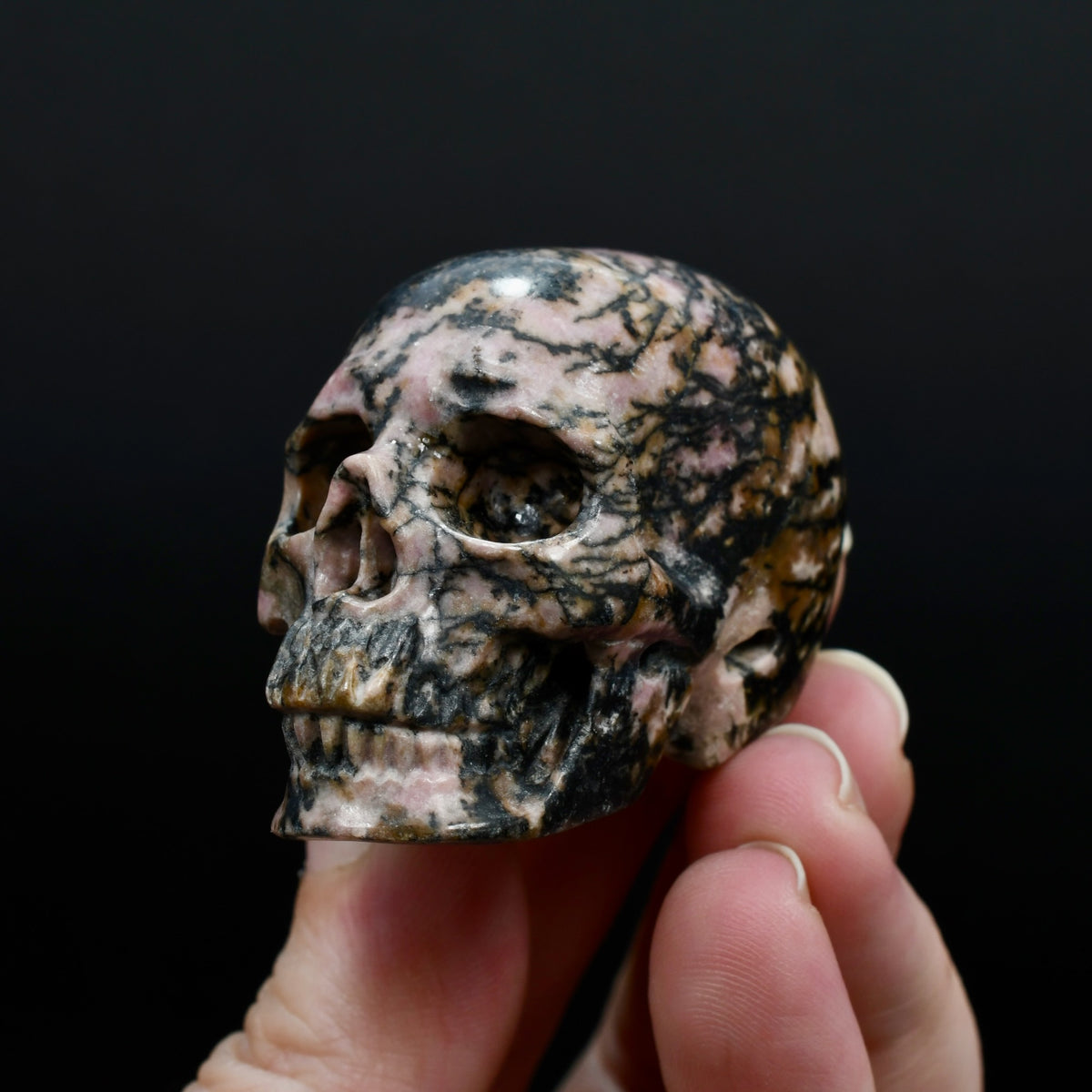 Pink Rhodonite Carved Crystal Skull Realistic