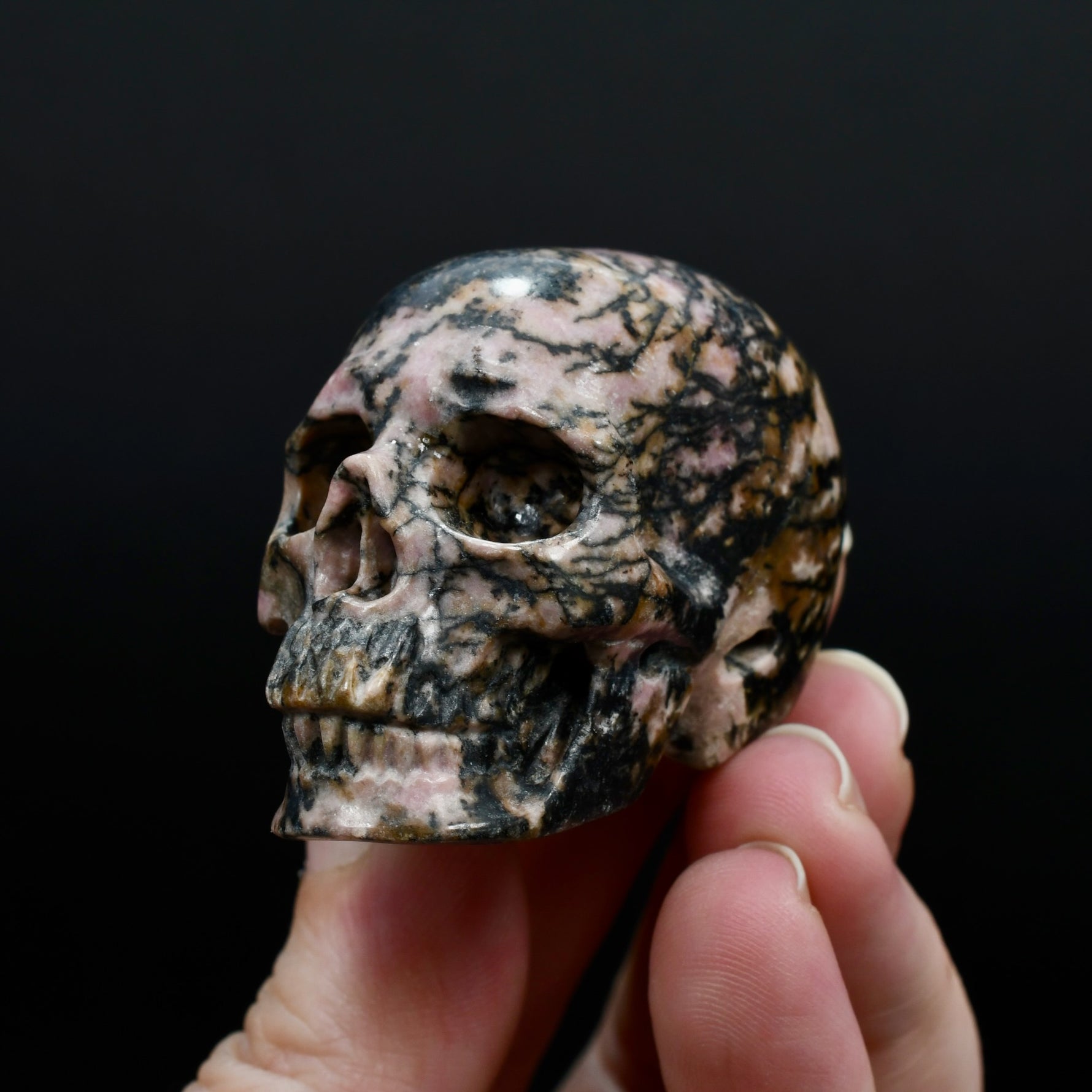 Pink Rhodonite Carved Crystal Skull Realistic