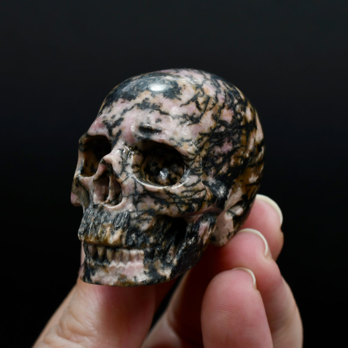 Pink Rhodonite Carved Crystal Skull Realistic