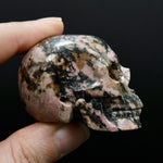 Pink Rhodonite Carved Crystal Skull Realistic