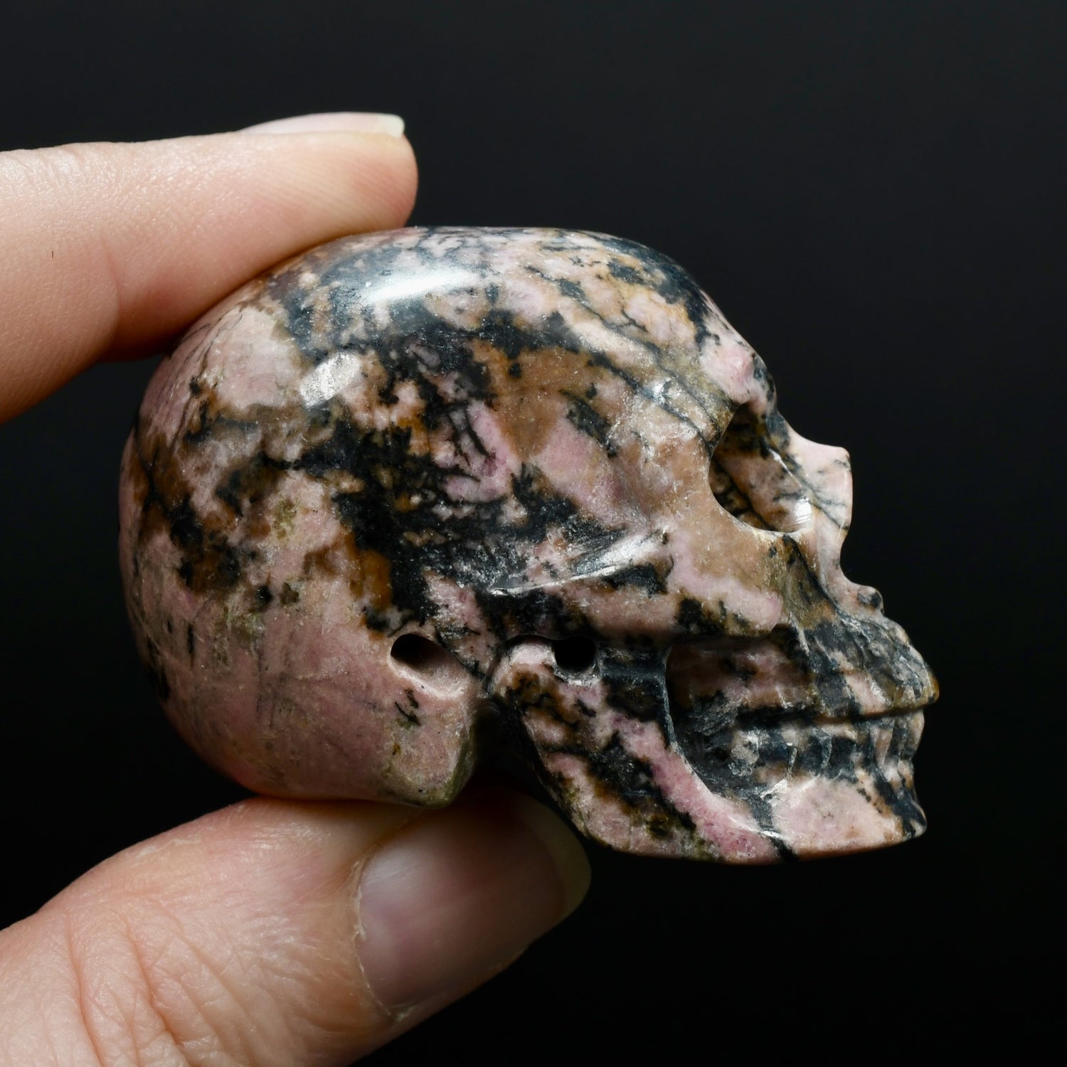 Pink Rhodonite Carved Crystal Skull Realistic