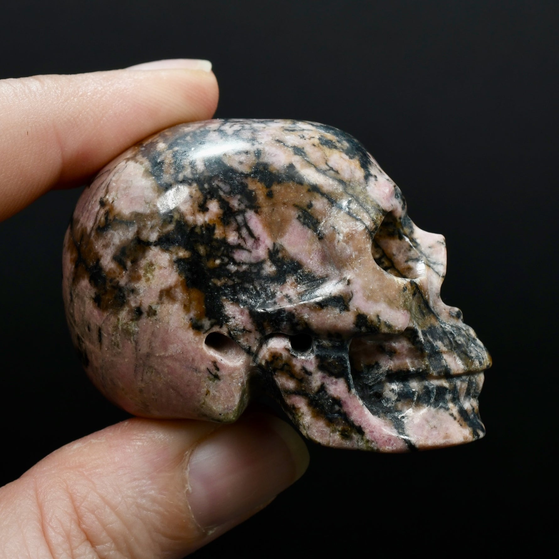 Pink Rhodonite Carved Crystal Skull Realistic