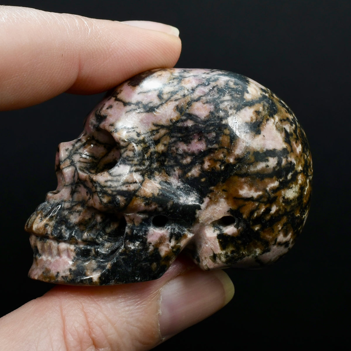Pink Rhodonite Carved Crystal Skull Realistic