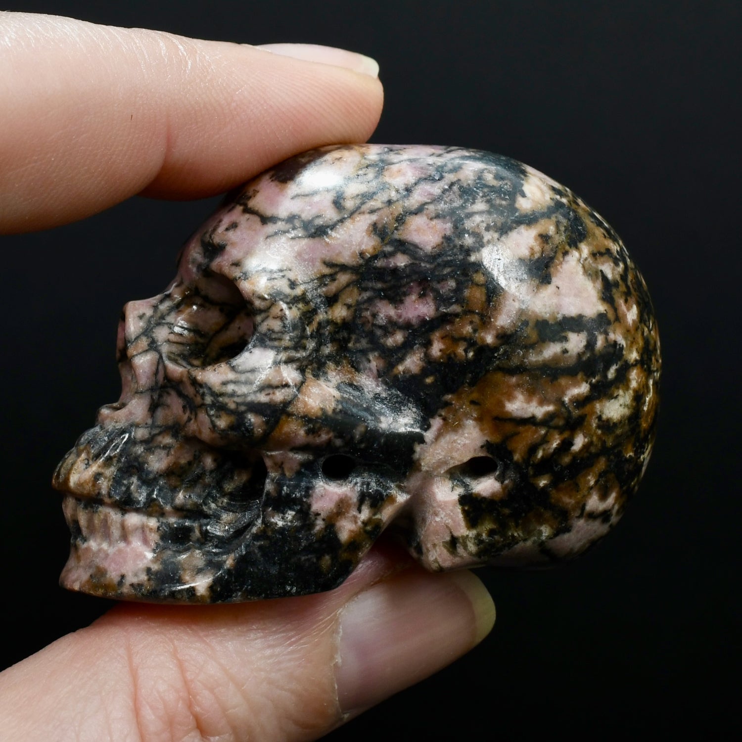 Pink Rhodonite Carved Crystal Skull Realistic