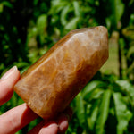 golden healer quartz, quartz healing tower, golden crystal point, healer quartz stone, polished quartz tower, golden light crystal, meditation quartz, crystal energy tower, reiki quartz stone, spiritual quartz point, high vibe quartz, golden healer point, healing crystal tower