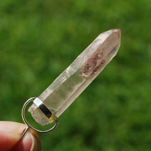 Load image into Gallery viewer, Inner Child Isis Face Pink Lithium Lemurian Seed Crystal Starbrary Pendant
