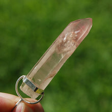 Load image into Gallery viewer, Inner Child Isis Face Pink Lithium Lemurian Seed Crystal Starbrary Pendant
