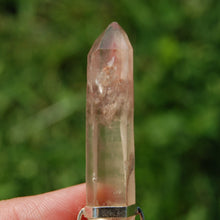 Load image into Gallery viewer, Inner Child Isis Face Pink Lithium Lemurian Seed Crystal Starbrary Pendant
