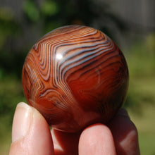 Load image into Gallery viewer, Red Sardonyx Banded Agate Crystal Sphere
