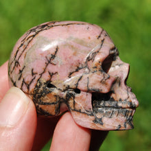 Load image into Gallery viewer, Rhodonite Carved Crystal Skull
