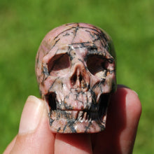 Load image into Gallery viewer, Rhodonite Carved Crystal Skull
