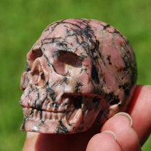 Load image into Gallery viewer, Rhodonite Carved Crystal Skull
