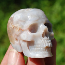 Load image into Gallery viewer, Sakura Flower Agate Carved Crystal Skull
