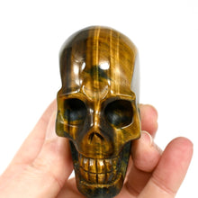 Load image into Gallery viewer, Tiger&#39;s Eye w Blue Carved Crystal Skull
