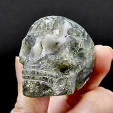 Load image into Gallery viewer, Moss Agate Carved Crystal Skull
