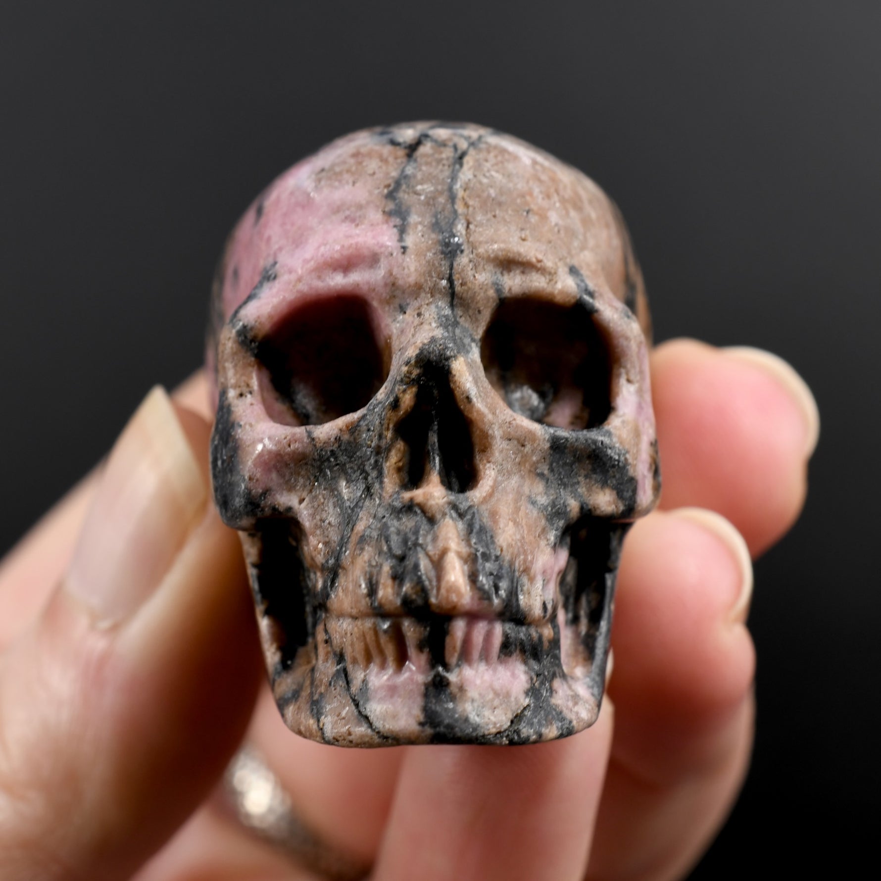 Rhodonite Carved Crystal Skull