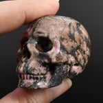Rhodonite Carved Crystal Skull