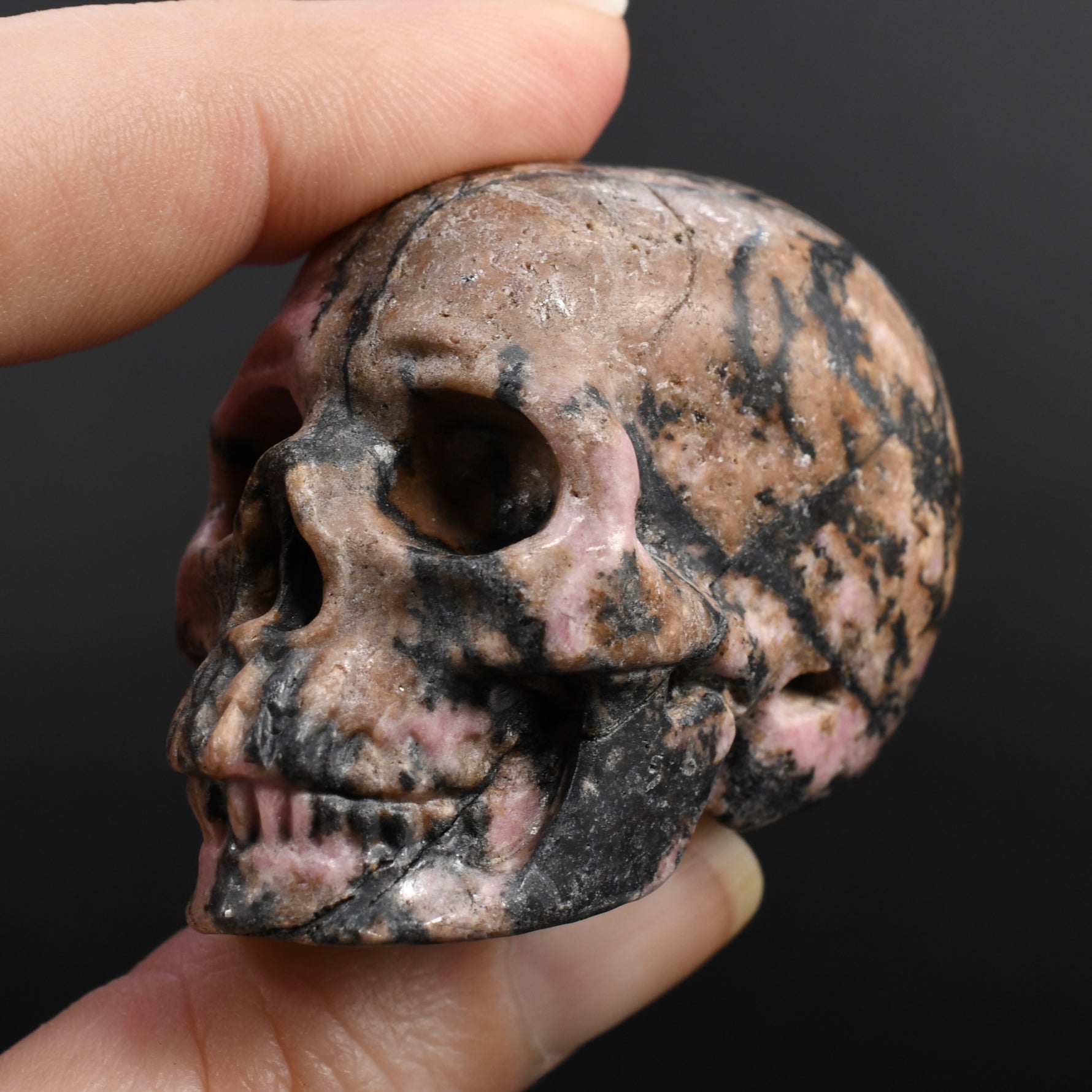 Rhodonite Carved Crystal Skull