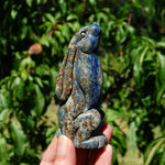 Hand-carved Lapis Lazuli crystal rabbit figurine with deep blue gemstone and golden pyrite flecks