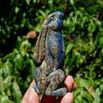 Hand-carved Lapis Lazuli crystal rabbit figurine with deep blue gemstone and golden pyrite flecks