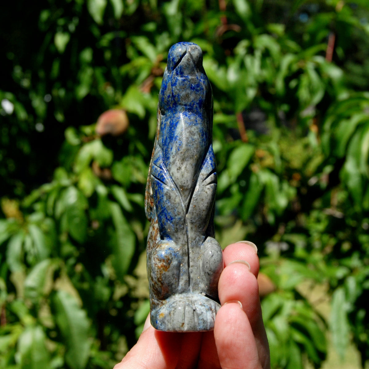 Hand-carved Lapis Lazuli crystal rabbit figurine with deep blue gemstone and golden pyrite flecks