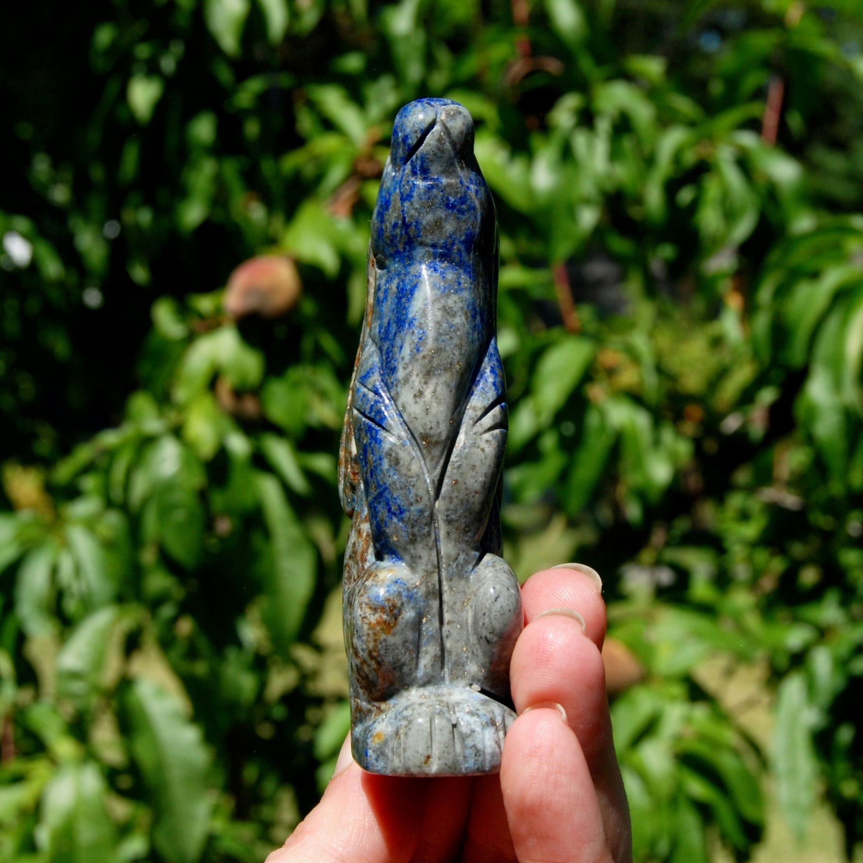 Hand-carved Lapis Lazuli crystal rabbit figurine with deep blue gemstone and golden pyrite flecks