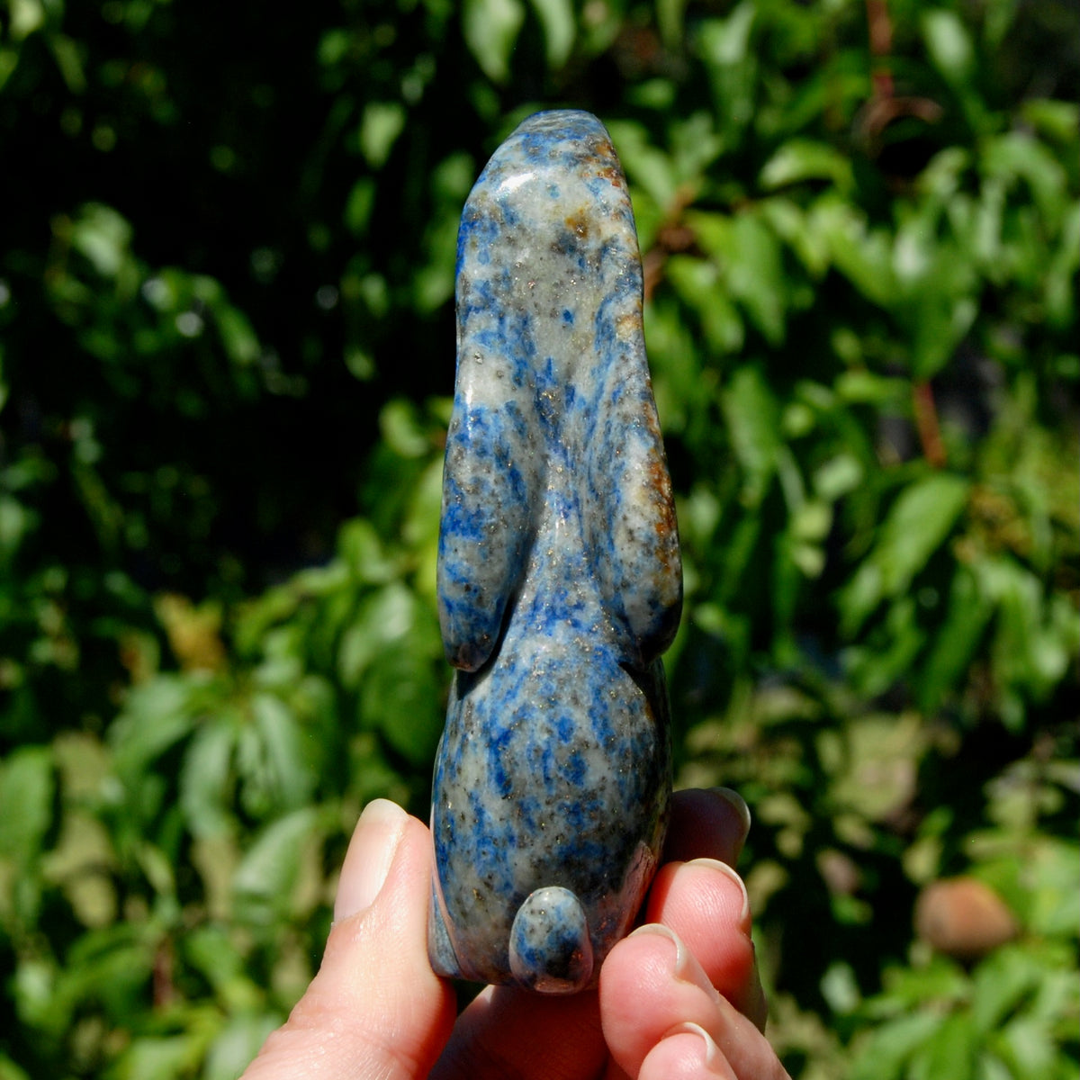 Hand-carved Lapis Lazuli crystal rabbit figurine with deep blue gemstone and golden pyrite flecks