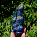 Hand-carved Lapis Lazuli crystal rabbit figurine with deep blue gemstone and golden pyrite flecks