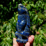 Hand-carved Lapis Lazuli crystal rabbit figurine with deep blue gemstone and golden pyrite flecks
