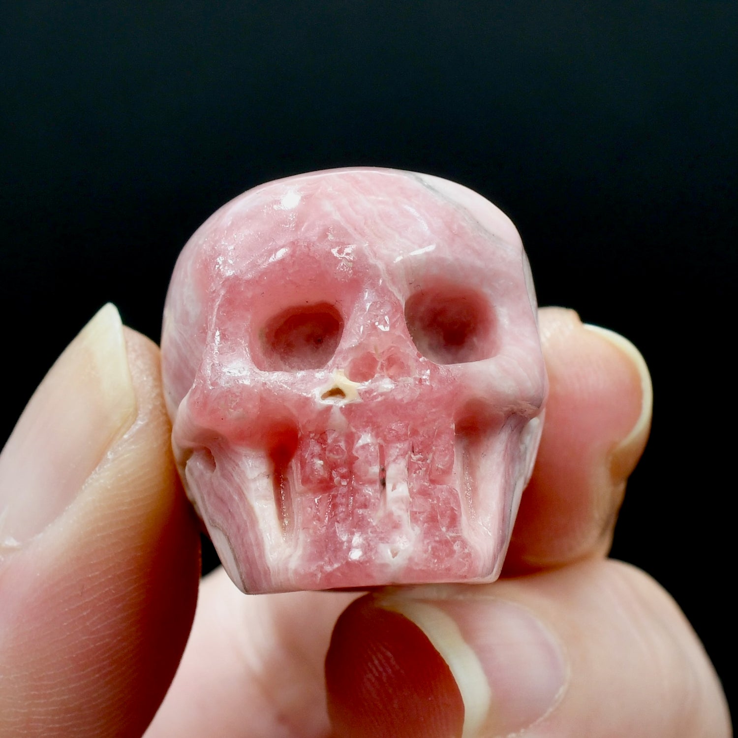 Rhodochrosite Carved Crystal Skull