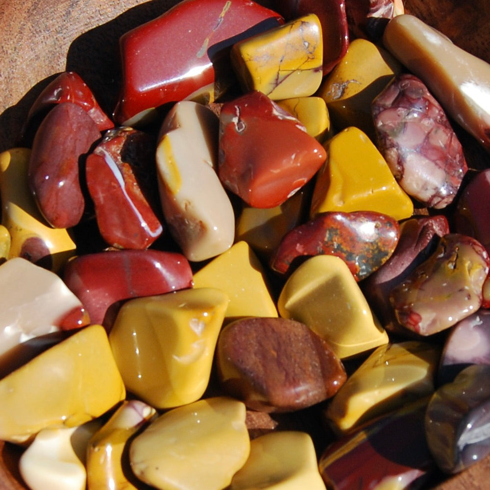 These pieces measure approximately .6 to .9 inches with most measuring .75 inches.  These Tiger's Eye tumbled stones are sold in sets of 6 pieces.