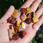 These pieces measure approximately .6 to .9 inches with most measuring .75 inches.  These Tiger's Eye tumbled stones are sold in sets of 6 pieces.